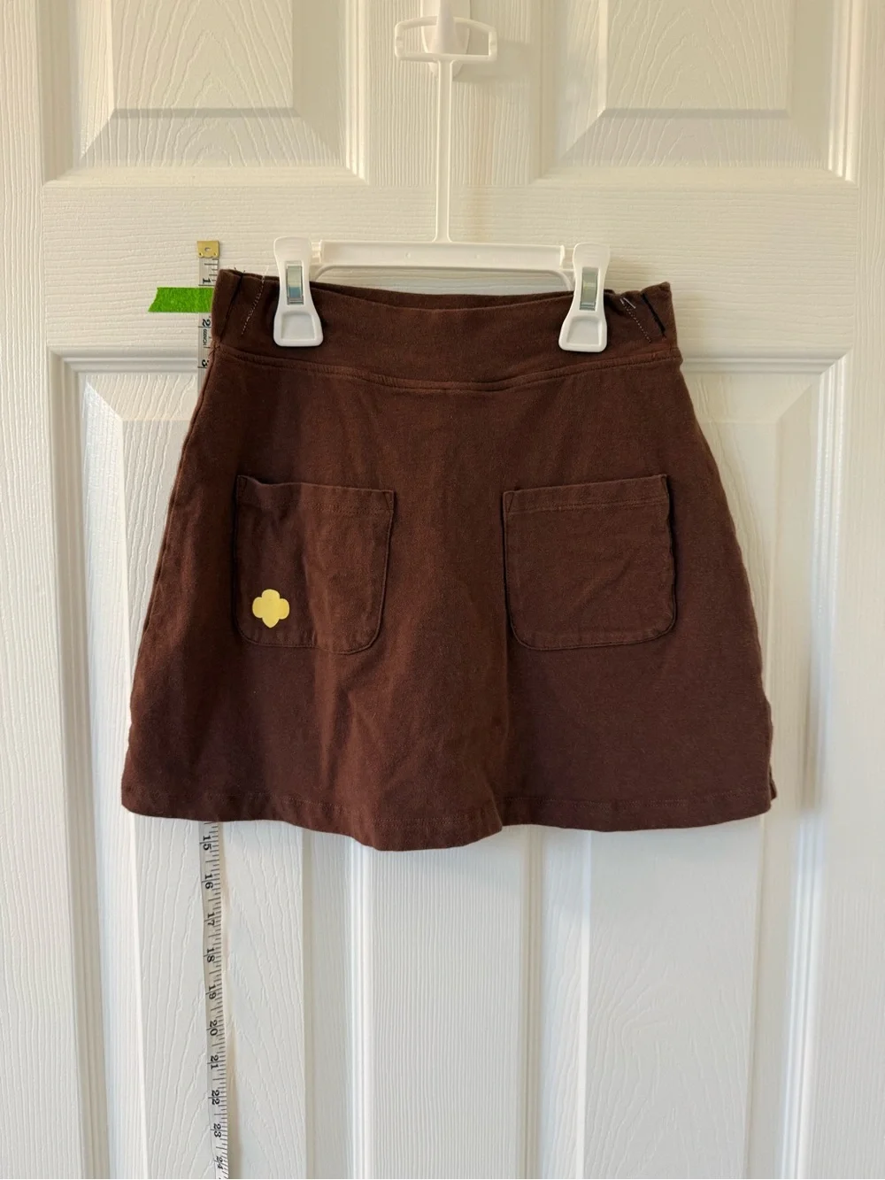 Brownie Girl Scouts Uniform. Tee shirt with skort and socks